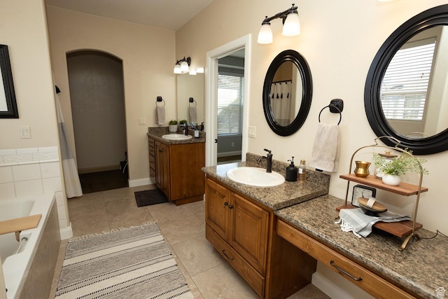 2195 S 1600 W, Richfield, UT 84701 - full bath featuring tile patterned flooring, tiled bath, and two vanities