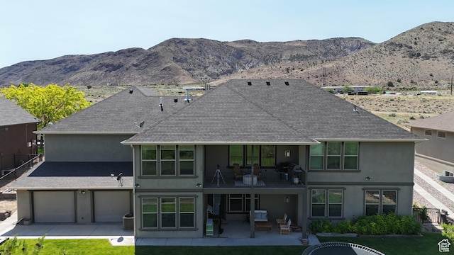 2195 S 1600 W, Richfield, UT 84701 - back of house featuring a balcony, stucco siding, and a shingled roof
