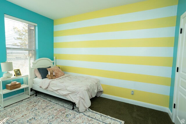 2195 S 1600 W, Richfield, UT 84701 - carpeted bedroom with baseboards and multiple windows