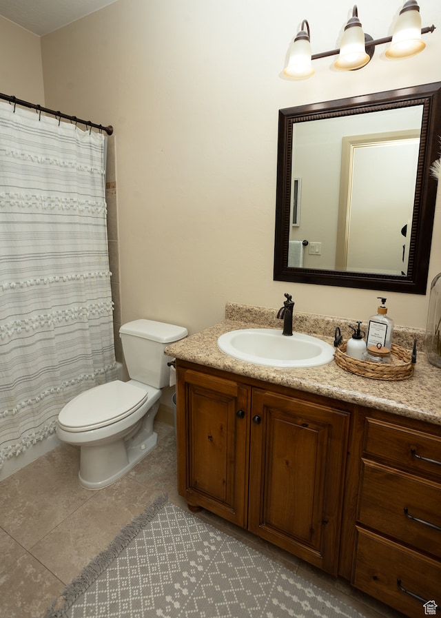 2195 S 1600 W, Richfield, UT 84701 - bathroom with tile patterned flooring, vanity, and toilet