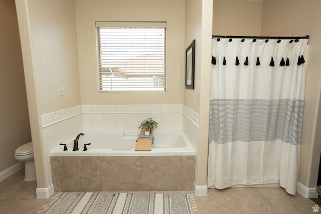 2195 S 1600 W, Richfield, UT 84701 - bathroom featuring tile patterned floors, a relaxing tiled tub, and toilet