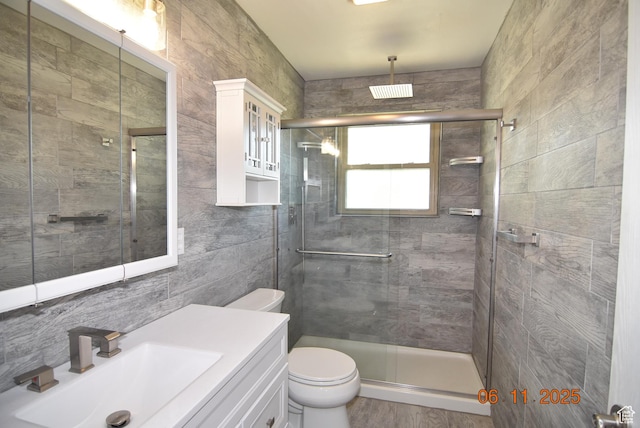 154 W 200 N, Mona, UT 84645 - full bathroom featuring tile walls, a shower stall, and vanity