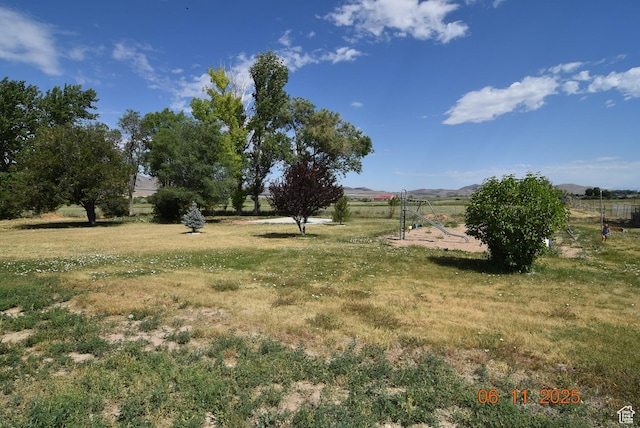 154 W 200 N, Mona, UT 84645 - view of green lawn featuring a mountain view