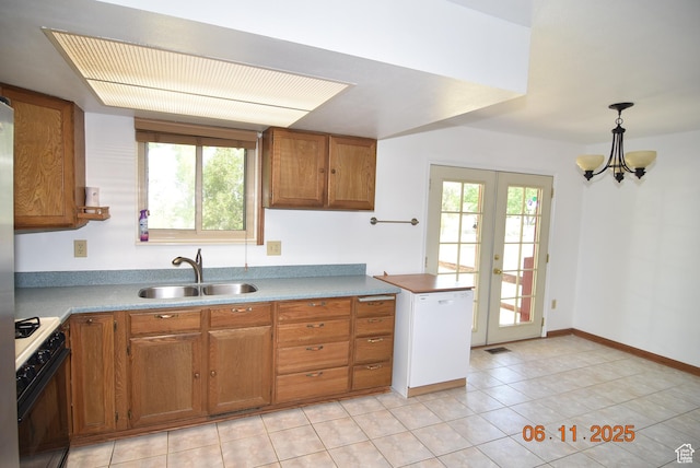 154 W 200 N, Mona, UT 84645 - kitchen featuring gas range oven, brown cabinetry, and french doors