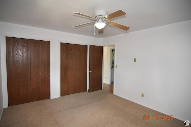 154 W 200 N, Mona, UT 84645 - unfurnished bedroom featuring multiple closets, carpet floors, and a ceiling fan