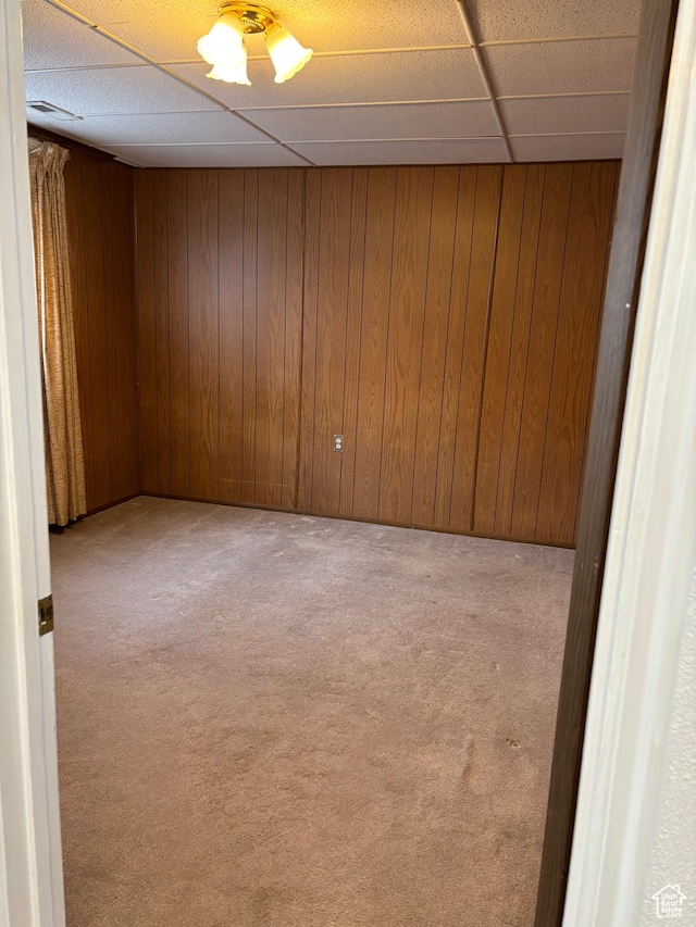 154 W 200 N, Mona, UT 84645 - carpeted spare room with a paneled ceiling and wooden walls
