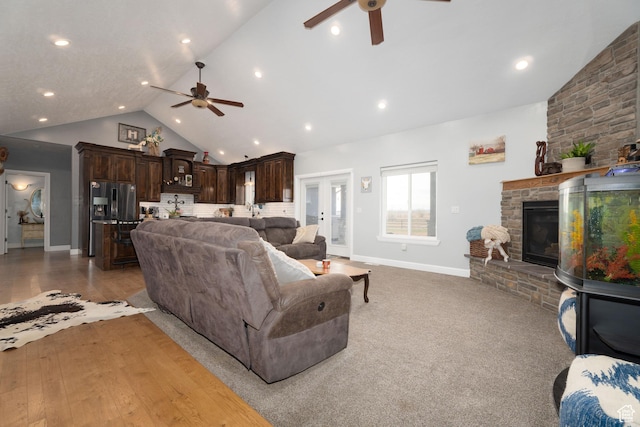 5361 N 4500 E, Roosevelt, UT 84066 - living room with ceiling fan, baseboards, a fireplace, high vaulted ceiling, and recessed lighting