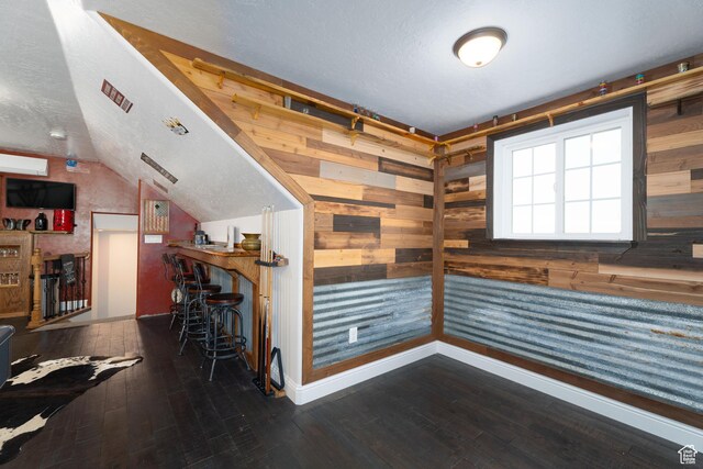 5361 N 4500 E, Roosevelt, UT 84066 - interior space with wooden walls, vaulted ceiling, a textured ceiling, and wood-type flooring
