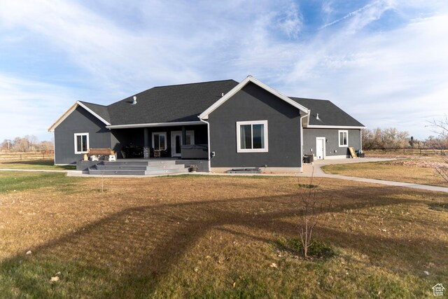 5361 N 4500 E, Roosevelt, UT 84066 - back of house featuring a yard, stucco siding, and a patio area