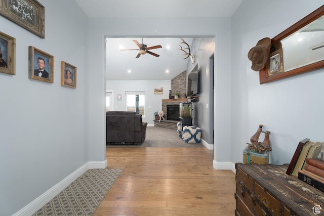 5361 N 4500 E, Roosevelt, UT 84066 - hallway with wood finished floors, vaulted ceiling, and baseboards