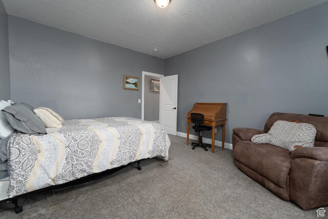 5361 N 4500 E, Roosevelt, UT 84066 - carpeted bedroom featuring baseboards and a textured ceiling