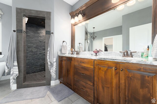5361 N 4500 E, Roosevelt, UT 84066 - full bathroom featuring tiled shower, double vanity, a chandelier, and tile patterned floors