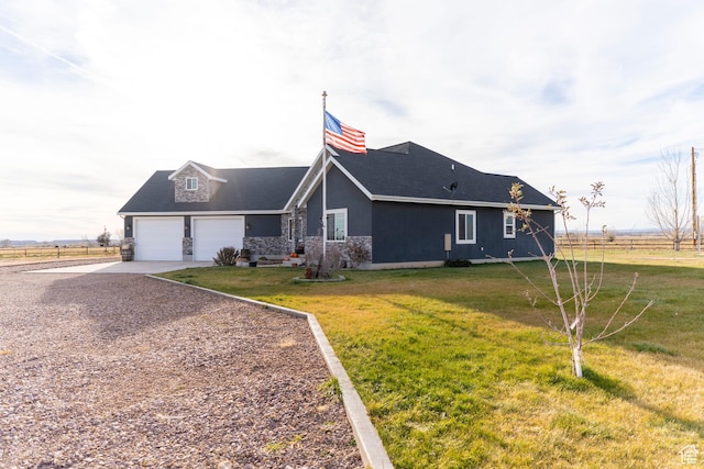 5361 N 4500 E, Roosevelt, UT 84066 - view of home's exterior featuring concrete driveway, an attached garage, roof with shingles, and stone siding
