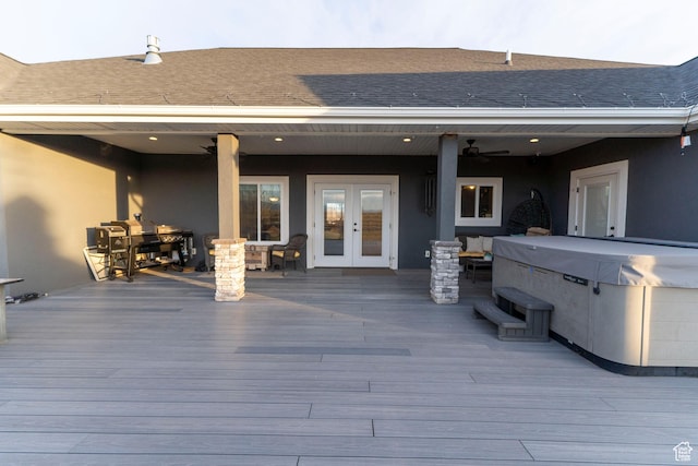 5361 N 4500 E, Roosevelt, UT 84066 - wooden terrace with french doors, a hot tub, outdoor dining space, and a ceiling fan