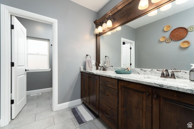 5361 N 4500 E, Roosevelt, UT 84066 - full bath with double vanity, baseboards, and tile patterned floors
