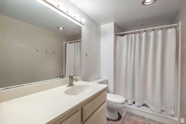 241 N Vine St Unit 205W, Salt Lake City, UT 84103 - bathroom featuring vanity, toilet, a shower with curtain, and recessed lighting