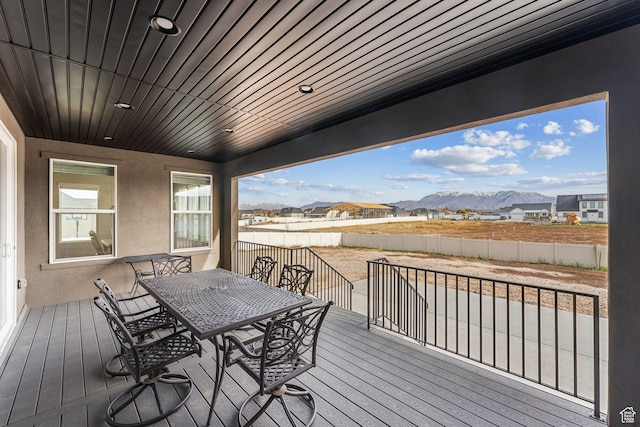 2118 N Snowy Crane Dr, Clinton, UT 84015 - deck featuring a mountain view and outdoor dining area