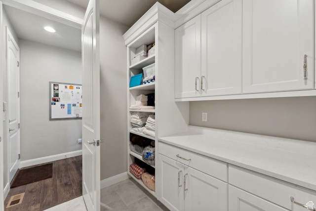 2118 N Snowy Crane Dr, Clinton, UT 84015 - kitchen featuring white cabinetry, light countertops, baseboards, recessed lighting, and open shelves