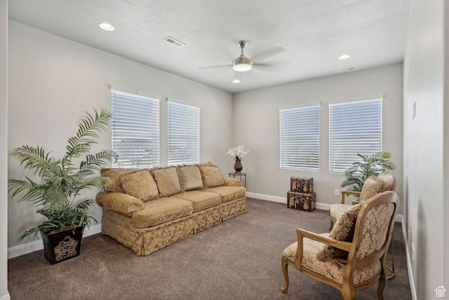 2118 N Snowy Crane Dr, Clinton, UT 84015 - carpeted living area featuring ceiling fan, baseboards, and recessed lighting