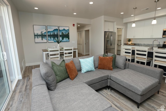 553 S 100 W Unit 202, Richfield, UT 84701 - living area with light wood-type flooring and recessed lighting