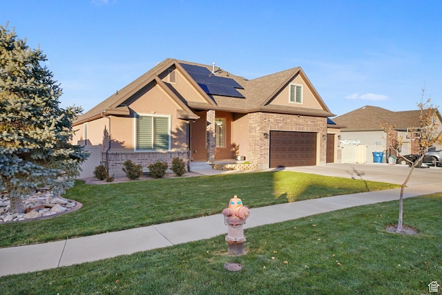 758 W Cedar View Dr, Saratoga Springs, UT 84045 - view of front of house featuring solar panels, brick siding, a front yard, driveway, and stucco siding