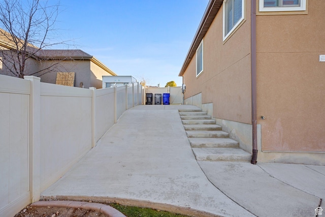 758 W Cedar View Dr, Saratoga Springs, UT 84045 - view of side of home featuring a patio and stucco siding
