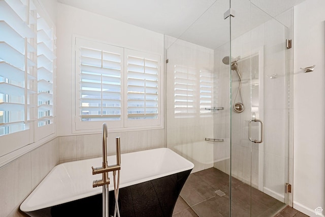 758 W Cedar View Dr, Saratoga Springs, UT 84045 - bathroom featuring a shower stall, tile patterned floors, and a freestanding tub
