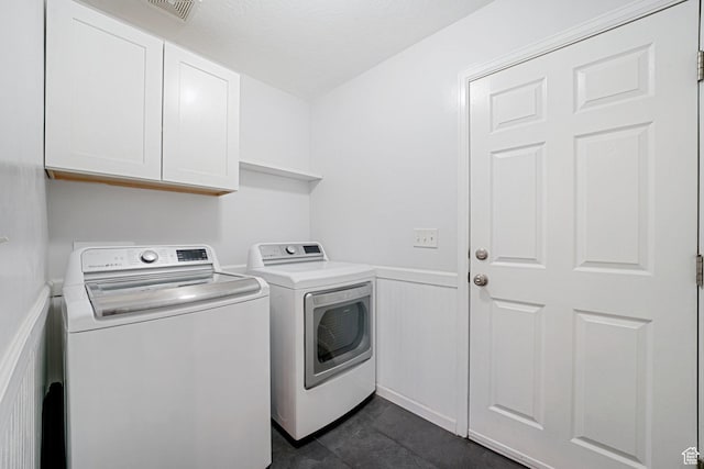 758 W Cedar View Dr, Saratoga Springs, UT 84045 - laundry area with independent washer and dryer, cabinet space, and wainscoting