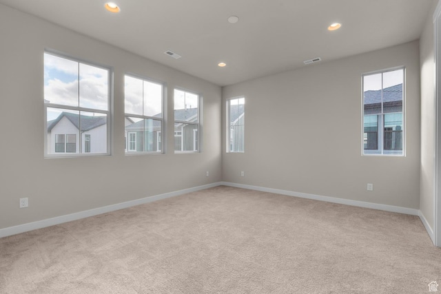 view of carpeted spare room