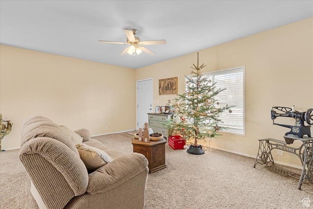 living room with carpet flooring and ceiling fan