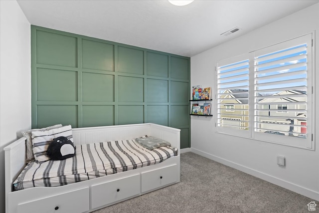 513 S Valkyries Ln, Saratoga Springs, UT 84045 - bedroom with a decorative wall, baseboards, visible vents, and carpet floors