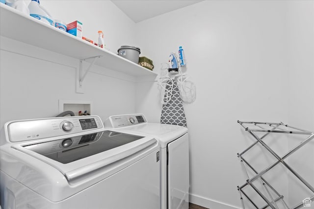 513 S Valkyries Ln, Saratoga Springs, UT 84045 - clothes washing area with separate washer and dryer, laundry area, and baseboards
