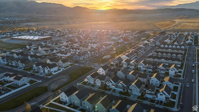 513 S Valkyries Ln, Saratoga Springs, UT 84045 - aerial view at dusk with a residential view and a mountain view