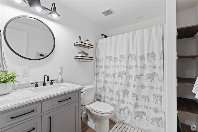 513 S Valkyries Ln, Saratoga Springs, UT 84045 - full bathroom featuring toilet, curtained shower, vanity, and visible vents