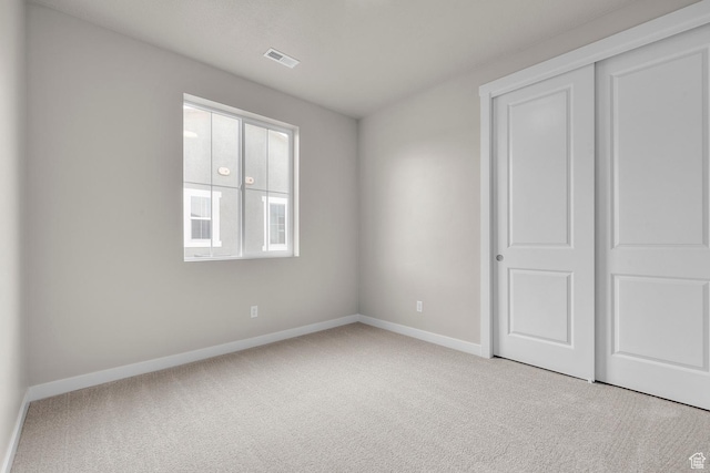 1839 S 2475 W, West Haven, UT 84401 - unfurnished bedroom featuring light carpet and a closet