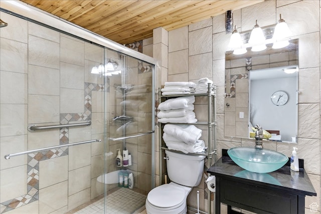 bathroom with a stall shower, tile walls, vanity, and wood ceiling