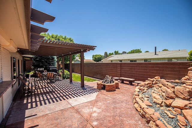 148 S Sunnybrook Dr, Salina, UT 84654 - fenced backyard with a fire pit, a patio area, and a pergola
