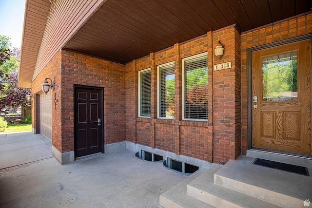 148 S Sunnybrook Dr, Salina, UT 84654 - view of exterior entry featuring brick siding and a porch