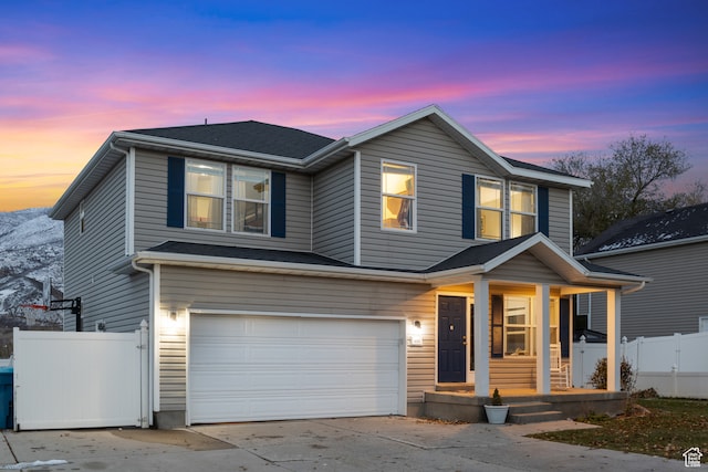 view of front of property with a garage