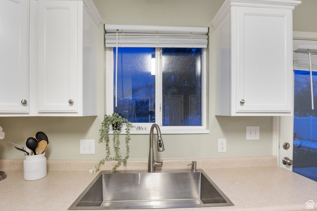 486 N 200 E, Santaquin, UT 84655 - kitchen with a sink, light countertops, and white cabinetry
