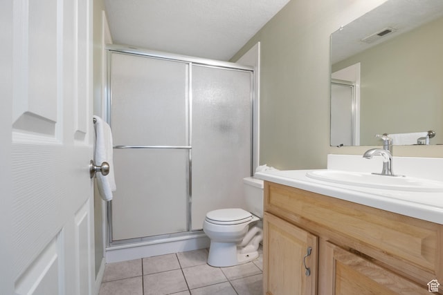 486 N 200 E, Santaquin, UT 84655 - full bathroom with vanity, tile patterned flooring, a stall shower, and toilet
