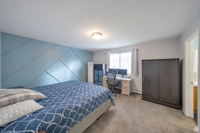 carpeted bedroom featuring a textured ceiling