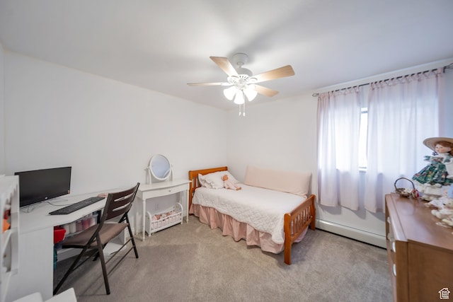 bedroom featuring ceiling fan, light colored carpet, and a baseboard heating unit