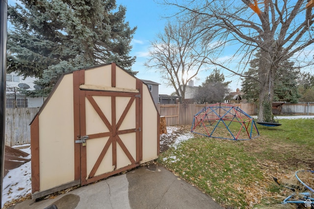 view of outbuilding featuring a yard