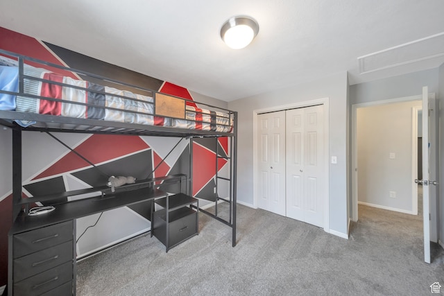 carpeted bedroom with a closet