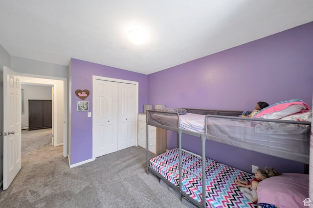 carpeted bedroom featuring a closet