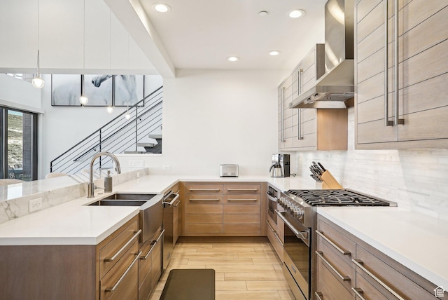 6412 Golden Bear Loop W, Park City, UT 84098 - kitchen with wall chimney range hood, appliances with stainless steel finishes, recessed lighting, a sink, and backsplash