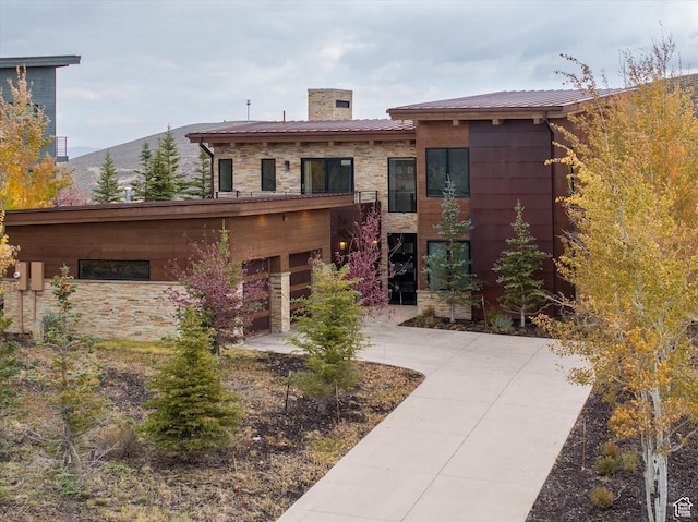6412 Golden Bear Loop W, Park City, UT 84098 - view of front of house with a chimney and stone siding