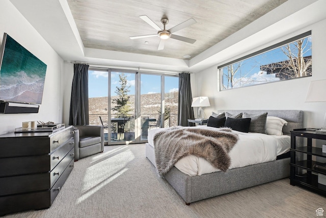 6412 Golden Bear Loop W, Park City, UT 84098 - carpeted bedroom with access to outside, a tray ceiling, and ceiling fan