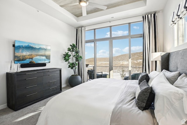 6412 Golden Bear Loop W, Park City, UT 84098 - bedroom with a tray ceiling, baseboards, carpet flooring, ceiling fan, and access to exterior
